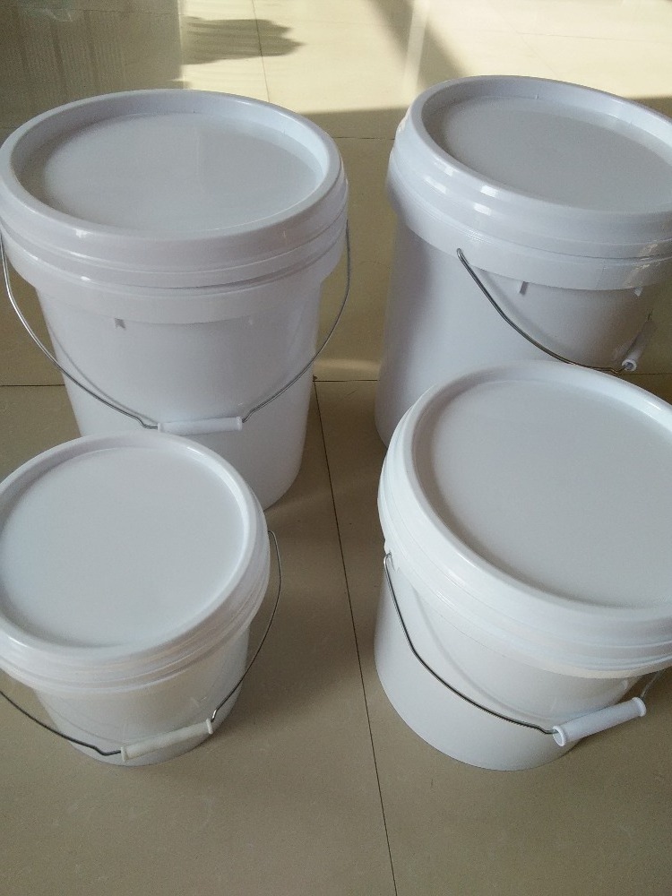 white plastic bucket with metal lid