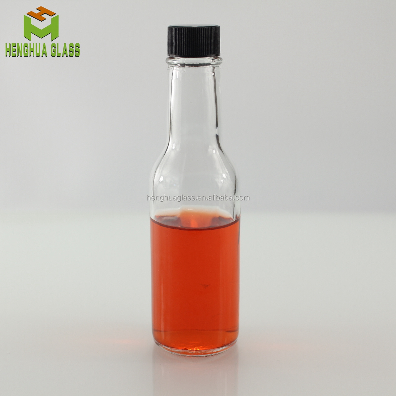 hot sale 5oz 150ml glass woozy bottle chili hot sauce salad dressing glass bottle with 24mm black  plastic screw cap