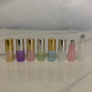 Hengjian luxury 3ml 5ml 10ml purple yellow green white pink blue perfume glass vial roller ball bottles with gold silver cap