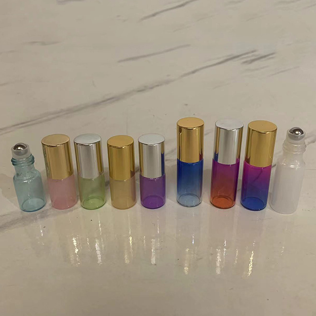 Hengjian luxury 3ml 5ml 10ml purple yellow green white pink blue perfume glass vial roller ball bottles with gold silver cap