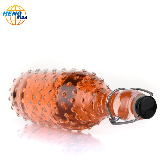 Wholesale 32oz big volume Point drink wine swing top glass bottles beverage bottles with metal clip caps in stock