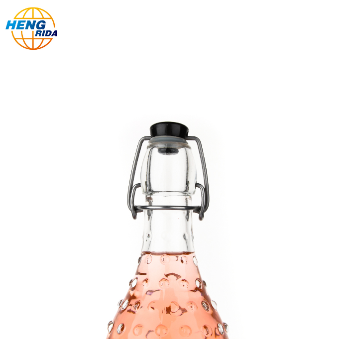 Wholesale 32oz big volume Point drink wine swing top glass bottles beverage bottles with metal clip caps in stock