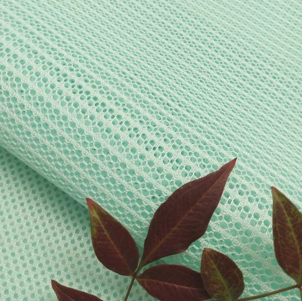 100% polyester 3d mesh honeycomb warp-knitted tricot dazzle fabric for water proof clothing textile material fabric