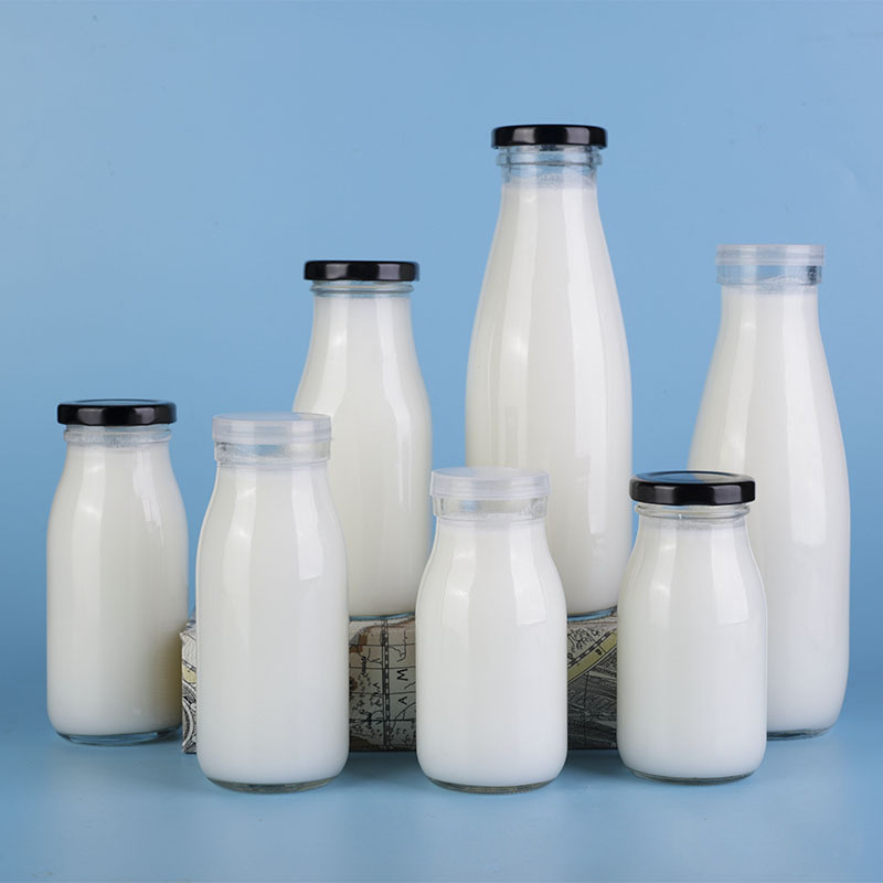 eco friendly recycled glass juice milk water bottle 500ml 1000ml swing top beverage/milk glass bottle with clip ceramics lid