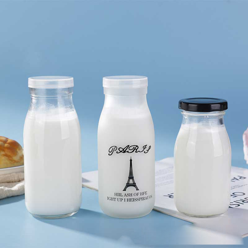 eco friendly recycled glass juice milk water bottle 500ml 1000ml swing top beverage/milk glass bottle with clip ceramics lid