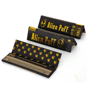 Alien Puff  Super Kingsize Unbleached Brown Rolling Paper Black Gold Foil Holograph Booklet  Natural Arabic Gum OEM  Custom Logo