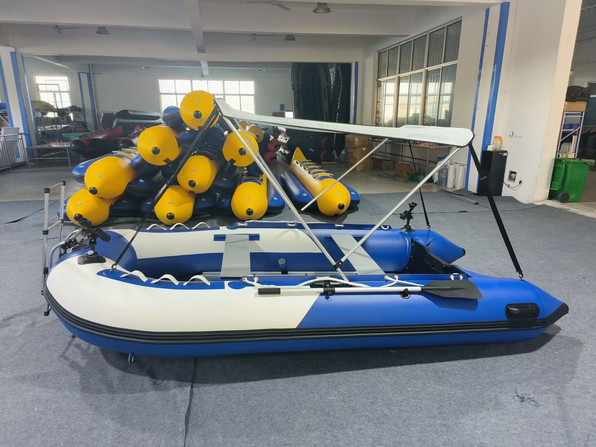 3.6m inflatable dinghy with sunshade taking 4 persons driving in lake, river and offshore sea