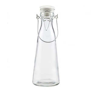 Wholesale ceramic cap sealing type 5 gallon 1 liter 500ml swing top glass bottles for juice and milk