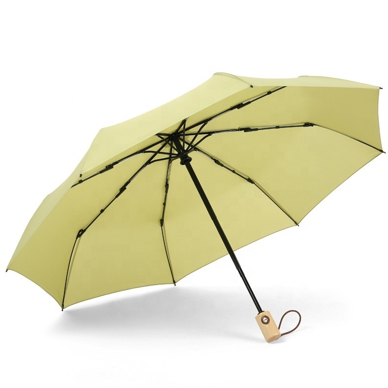 Solid color literary wholesale custom fully automatic 3 folding gift umbrella with wooden handle