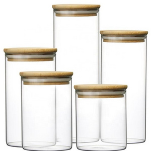 Borosilicate glass storage jar with bamboo lid for tube shaped glass storage jar for glass spice jar with wooden lid