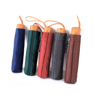 Windproof Rainy And Sunny Wooden Handle Wine Red Manual Open And Close Stripe Printing Folding Umbrella