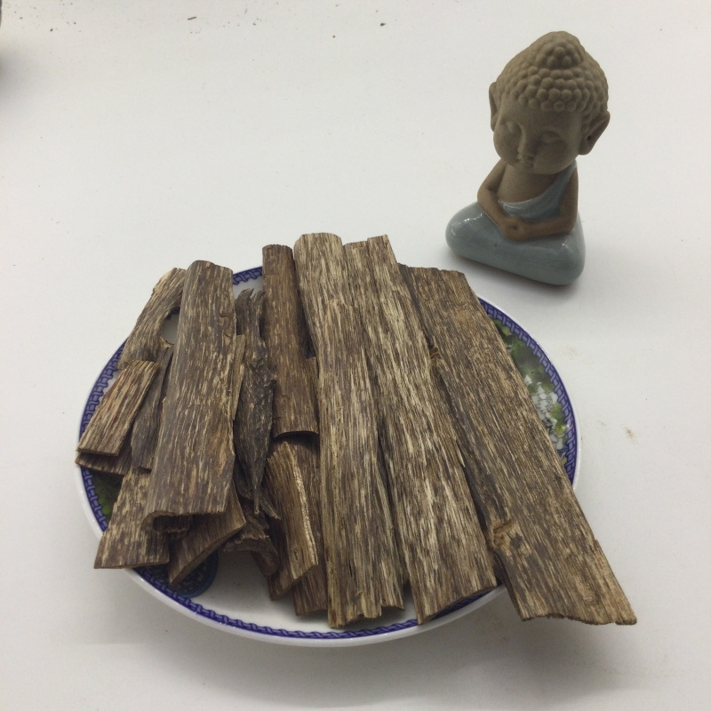 Vietnamese agarwood flakes with strong aroma thin Agarwood logs  oud chips oud wood