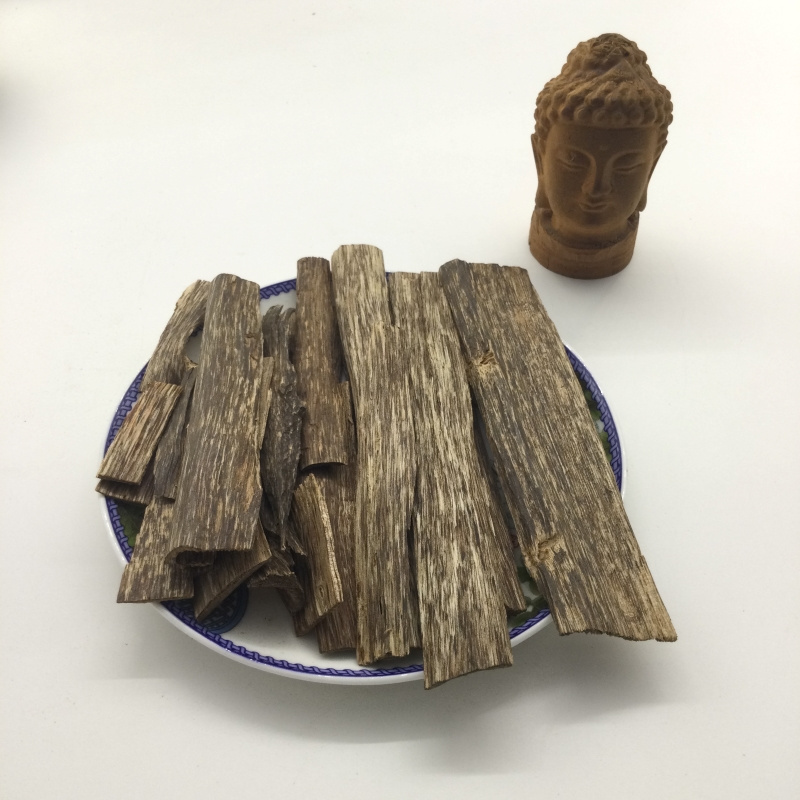 Vietnamese agarwood flakes with strong aroma thin Agarwood logs  oud chips oud wood