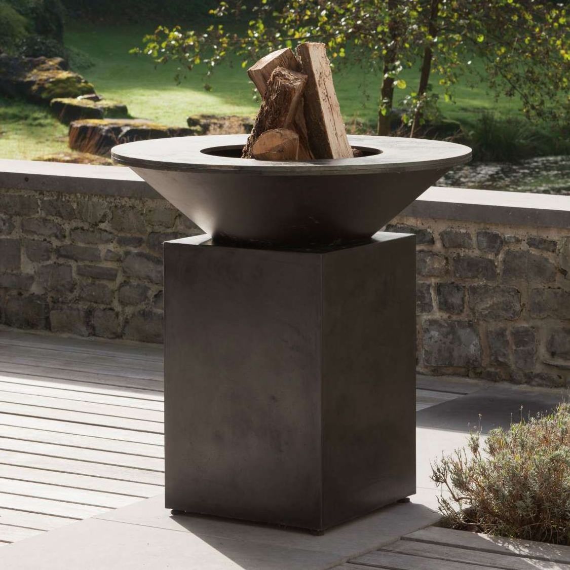 Outdoor Corten steel fire pit with barbecue grill wooden grill bbq