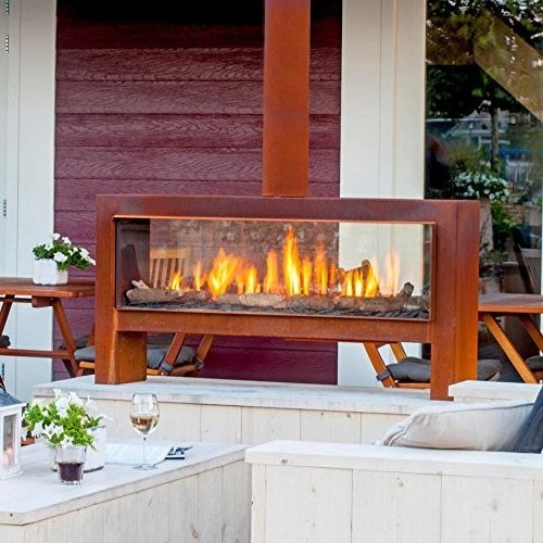 Outdoor antique rusty corten steel metal fireplace with chimney