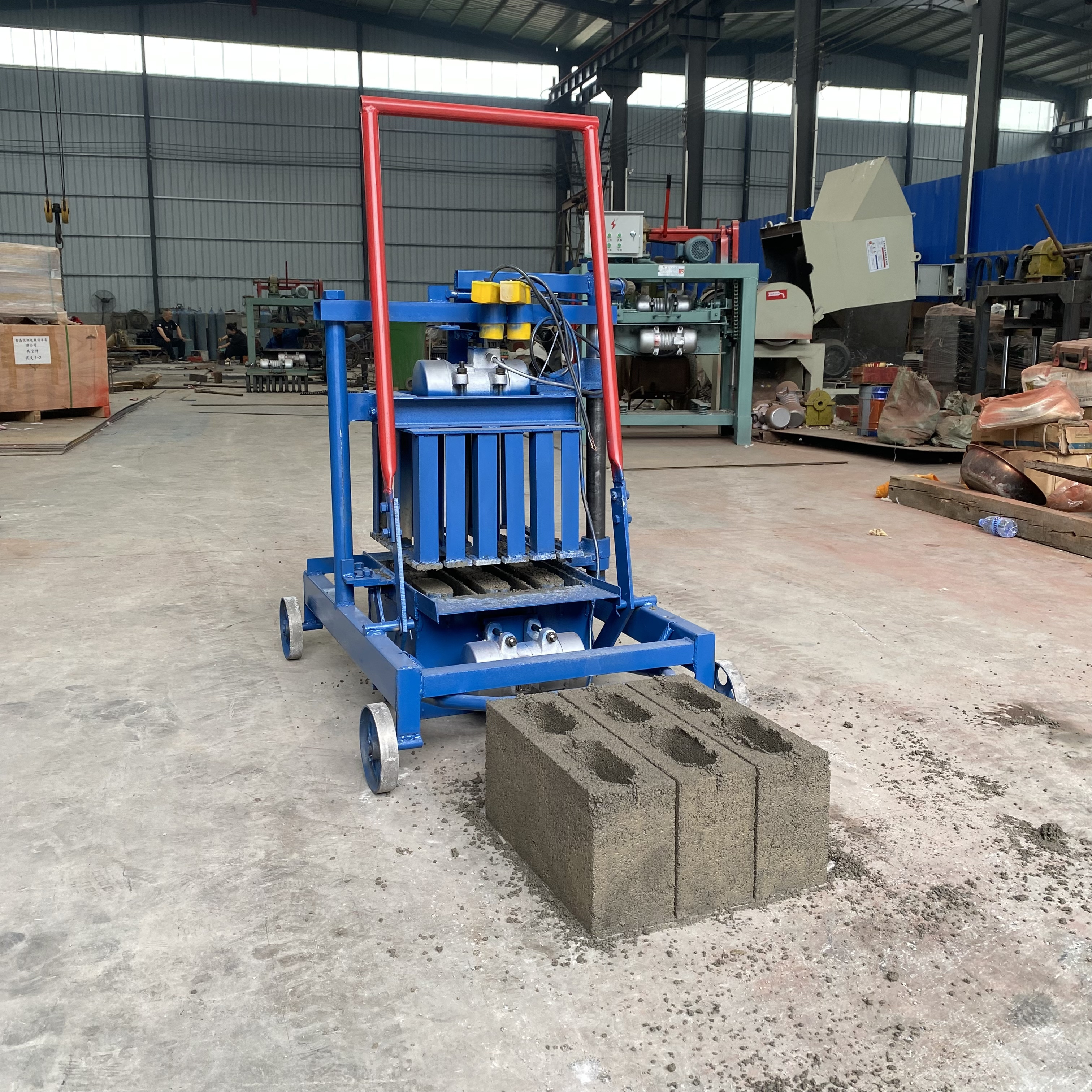 manual cement egg laying curb block machine mobile interlocking concrete brick making machine price in Pakistan