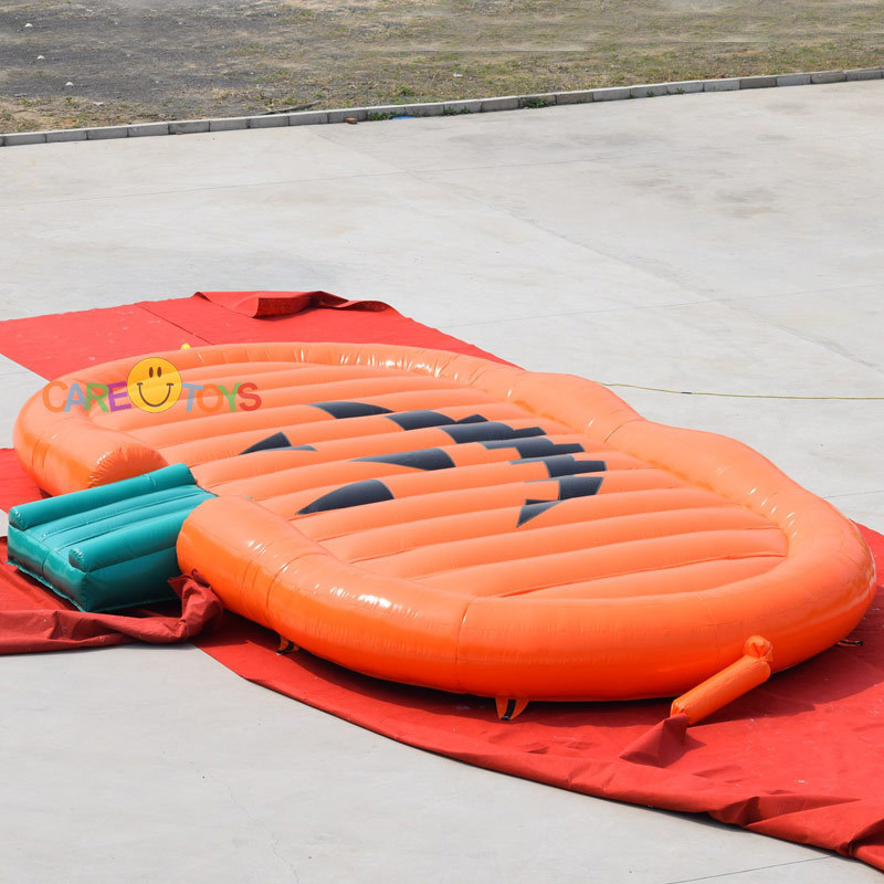 customized giant pumpkin inflatable bounce pad outdoor jump pillow kids jump pad for sale