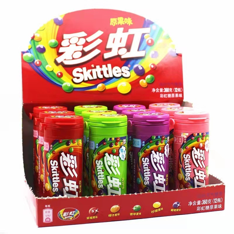 China Hot Selling Sweet 30g Exotic Snacks Candy Toys Multicolor Mixed Fruit Flavor Skittless Glue Free Chocolate Fruit Candies