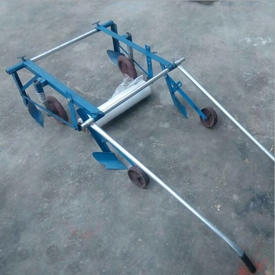 Agriculture implement tractor plastic mulch laying machine