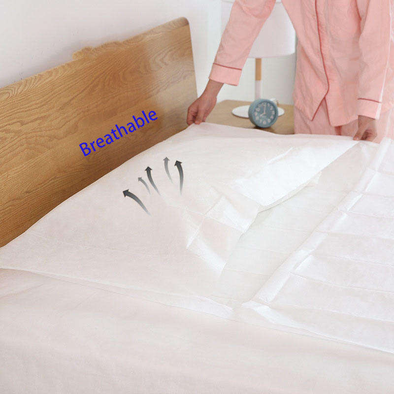 Wholesale non woven super soft disposable bed sheet cover pillow case one time use individual package portable bed sheet cover