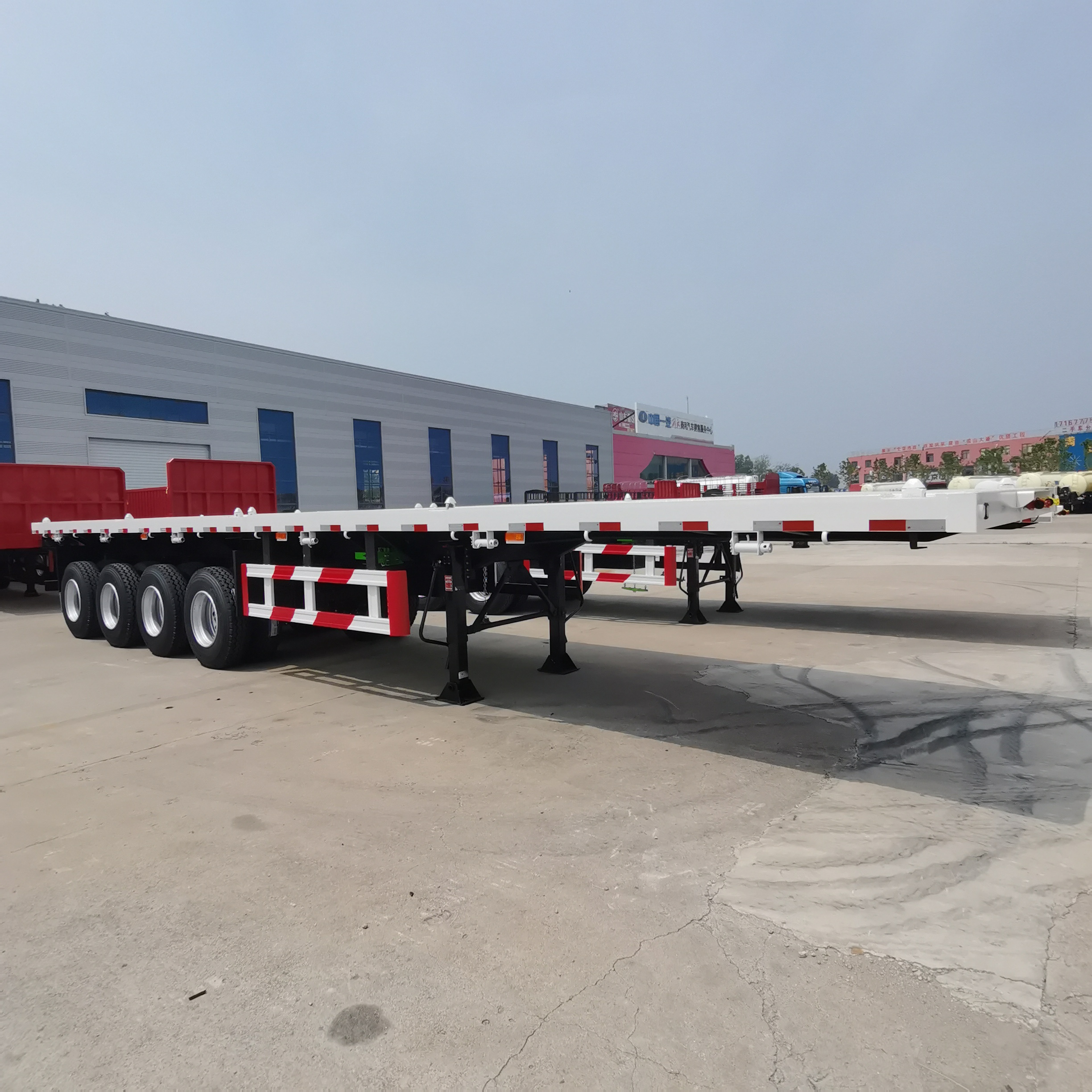 Heavy Duty 40 Feet Flat bed 3 4 Axles 20 Ft 40 Ft 50 Ft 60 Ft Container Semi Truck Flatbed Trailer for tractor head