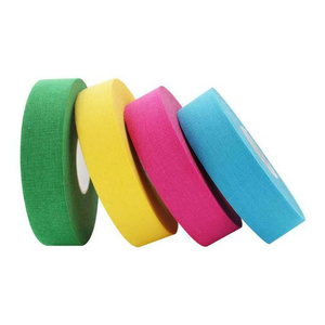 Ice hockey adhesive tape, Hockey bat and baseball bat grip binding