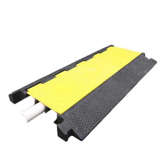 Black and yellow rubber plastic speed bump cable ramp protector