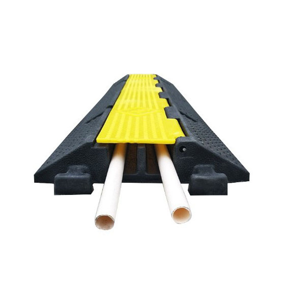 Black and yellow rubber plastic speed bump cable ramp protector