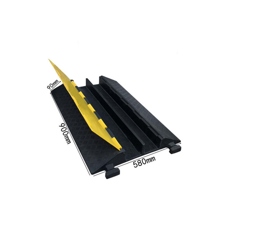 Black and yellow rubber plastic speed bump cable ramp protector