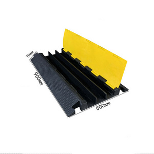 Black and yellow rubber plastic speed bump cable ramp protector