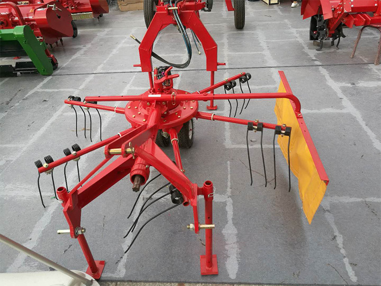 High quality and High Efficiency Finger Wheel Hay Rake Factory directly sell grass tedder pto hay rake