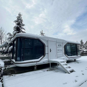 Beach Hotel host families prefabricated container houses on wheels, space modules, apple cabins for living and working