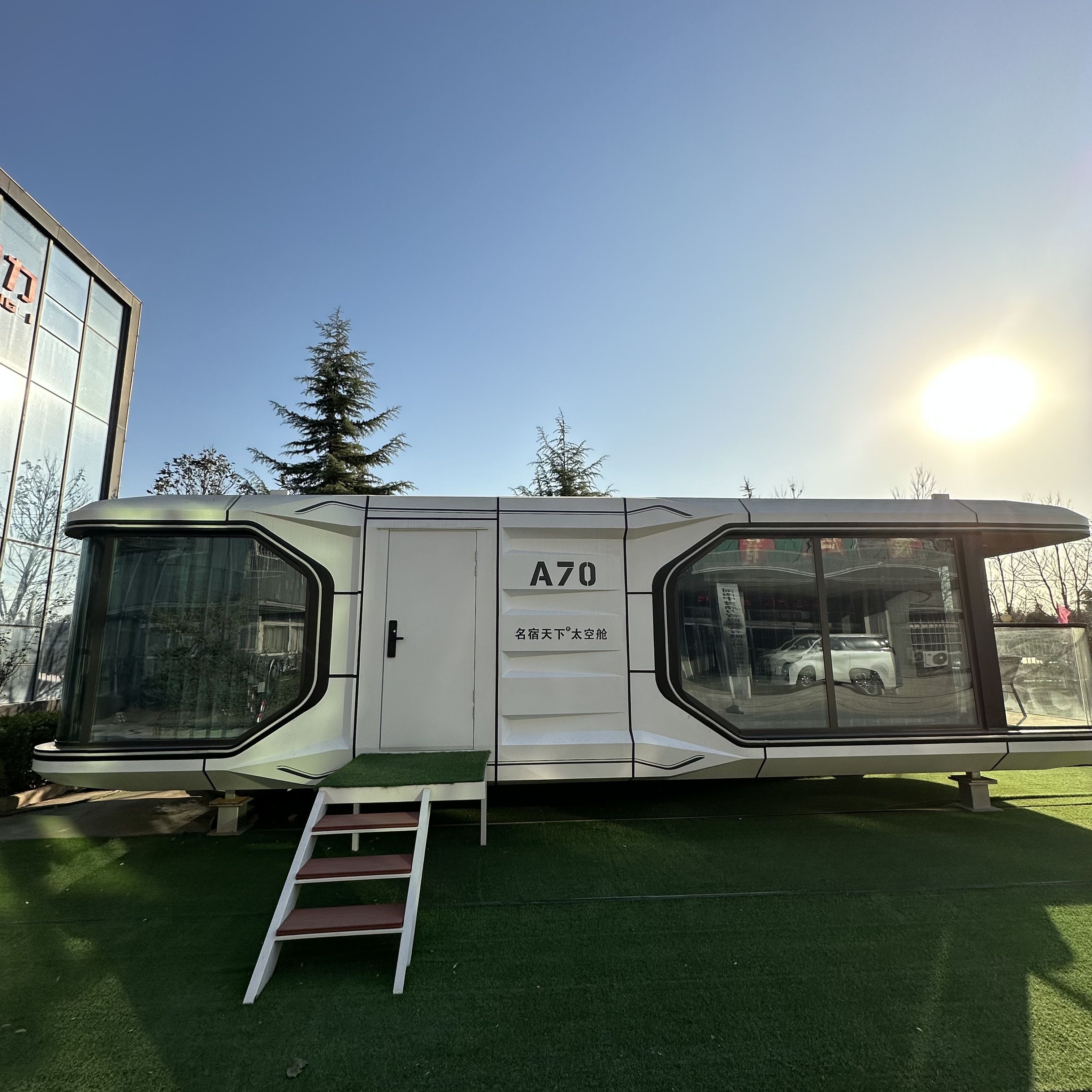 Beach Hotel host families prefabricated container houses on wheels, space modules, apple cabins for living and working