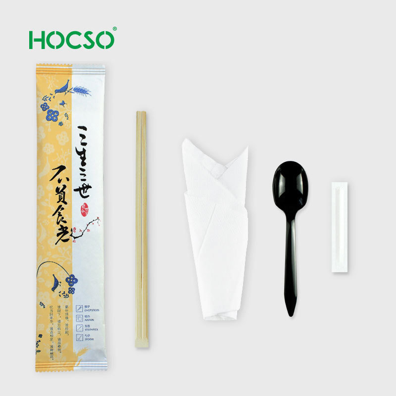 Chinese cutlery kit include disposable chopstick and spoon wrapped with napkin in paper pouch