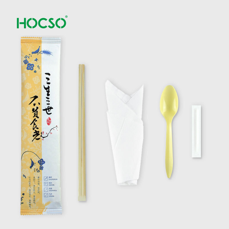 Chinese cutlery kit include disposable chopstick and spoon wrapped with napkin in paper pouch