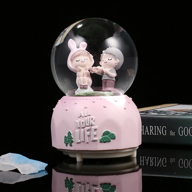 custom love wedding romantic sakura kar kuresi pink human music box water snowball snowglobe maker glass resin couple snow globe