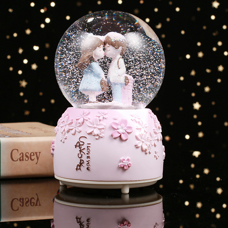 custom love wedding romantic sakura kar kuresi pink human music box water snowball snowglobe maker glass resin couple snow globe