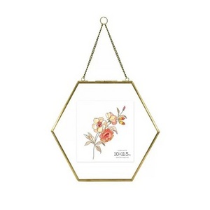 Finest Quality Brass And Glass Wall Hanging Photo Frame Hexagon Shape Glass Photo Frame At Attractive Price