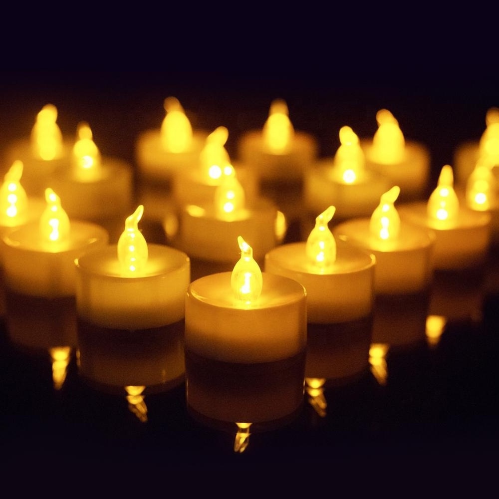 Homemory Flameless Battery Operated Tea Lights, Small Yellow Flickering LED Candles for Wedding, Holiday, Home Decoration