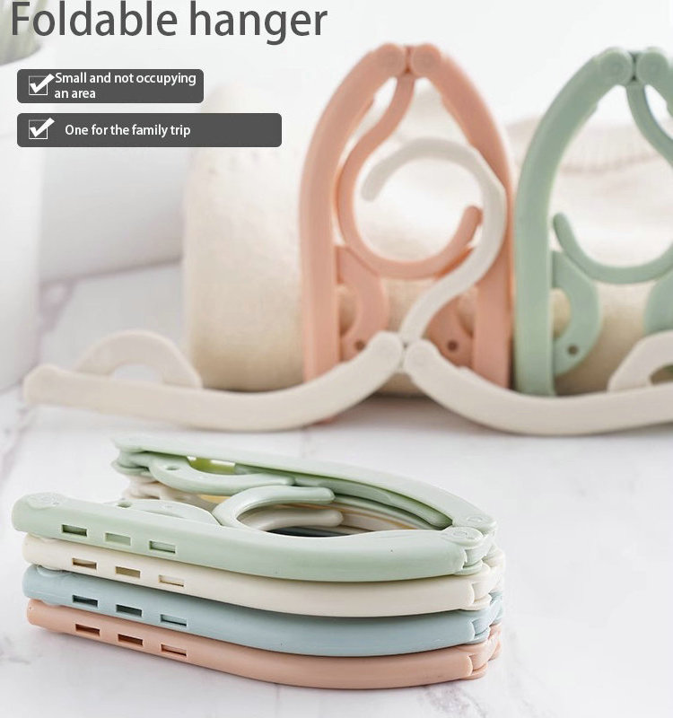 Folding travel portable plastic multifunctional magic hanger children retractable hanger wholesale