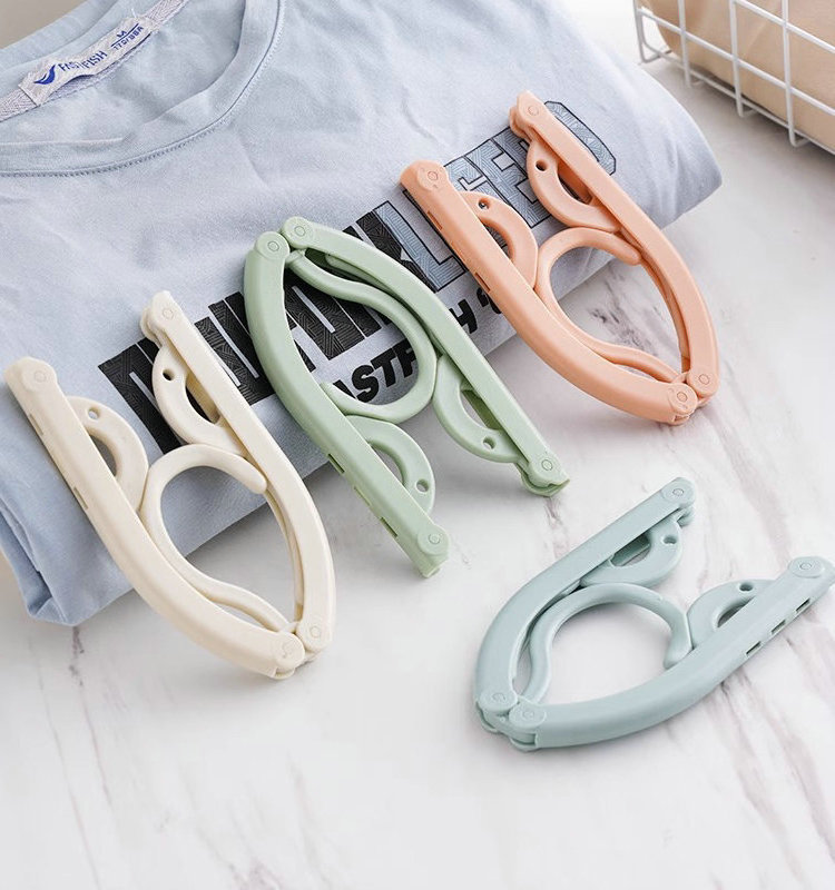 Folding travel portable plastic multifunctional magic hanger children retractable hanger wholesale