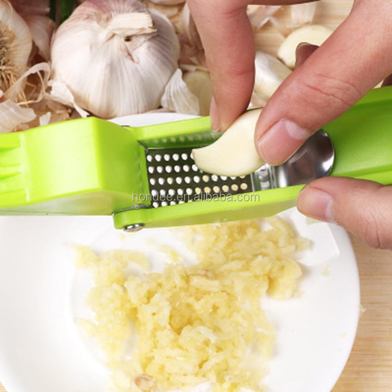 Food Glade Multiple Colors Kitchen Crusher Stainless Steel and Plastic Garlic Press Rocker