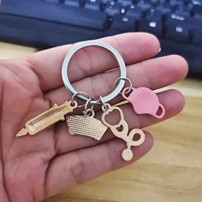 Factory Custom Promotional Logo Keychain Anime Couple In Bulk Metal Retractable Assistant Acrylic Keyring Nurse Blank Keychain