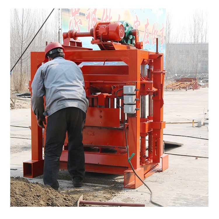 Red qt4-40 Interlocking Brick Making Machine Price With Paver Brick Moulds