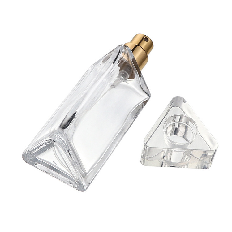 Free sample  30ml 50ml Unique Empty Glass Flat Refillable Perfume Bottles With Spray pumps Triangle shape hot sale