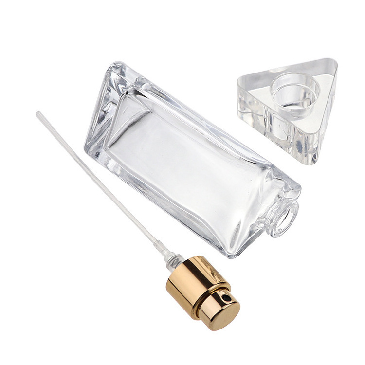 Free sample  30ml 50ml Unique Empty Glass Flat Refillable Perfume Bottles With Spray pumps Triangle shape hot sale