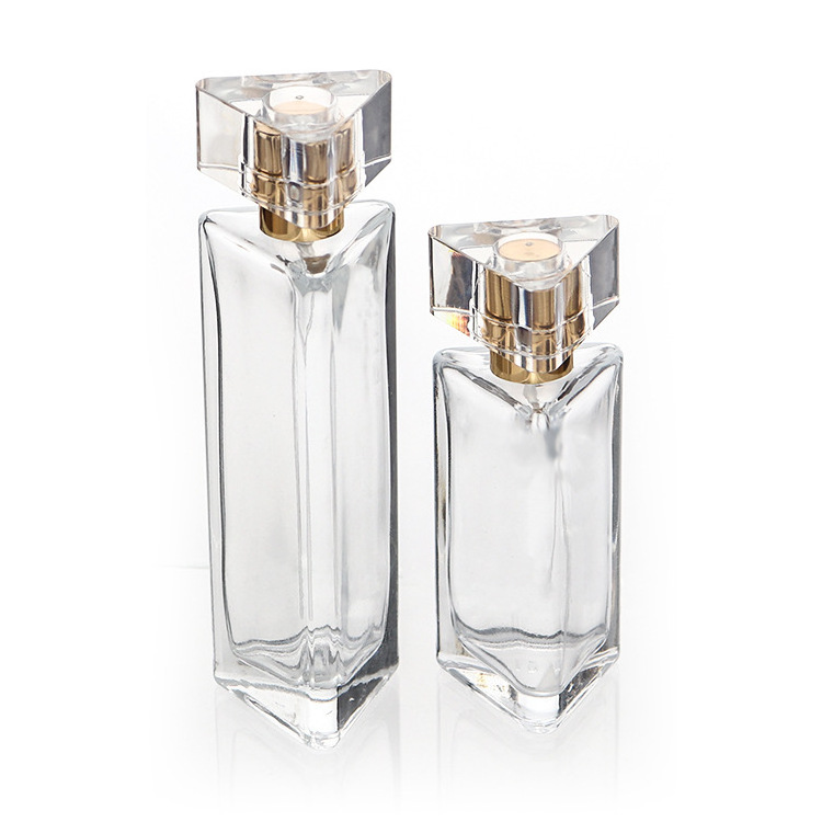 Free sample  30ml 50ml Unique Empty Glass Flat Refillable Perfume Bottles With Spray pumps Triangle shape hot sale