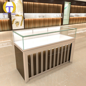 Luxury led strip light design metal gold glass display showcase modern jewelry kiosks for mall sale Pearl display case