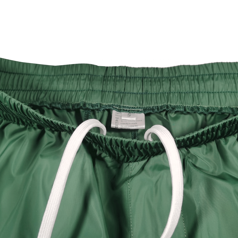 OEM Design Wholesale 100% Nylon Jogger Mens Track Pants Solid Color Pocket Windbreaker Pants