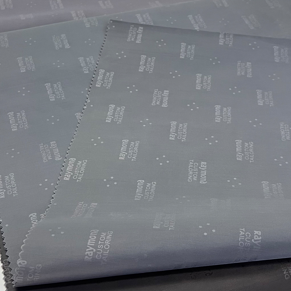 Suit garment lining 100% polyester twill taffeta fabric with emboss